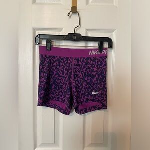 Nike Pro Athletic Shorts in Purple Geometric Design